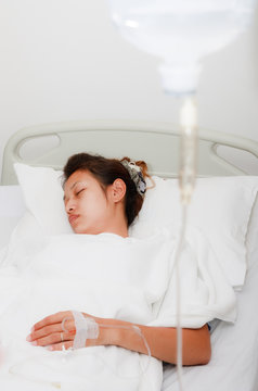 Woman Patient Sleepin In Hospital Bed