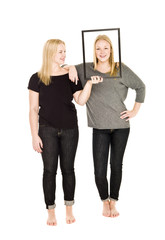 Obraz premium Two girls and a frame