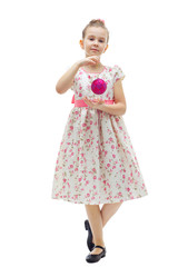 Cute little girl with a christmas-tree ball