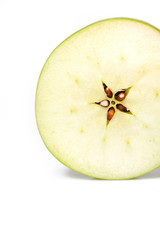 fresh green apple cut into slices. isolated on white background