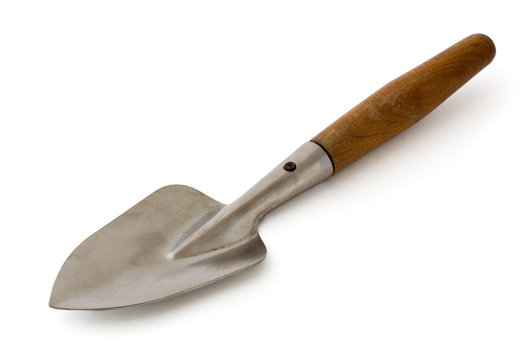Old garden trowel isolated on white