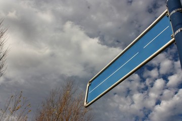 Blue metal street sign