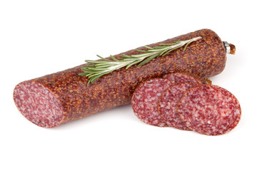 Slices italian salami sausage with rosemary