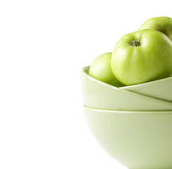 Bowl with green apples