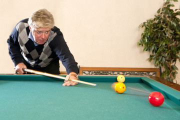 Fototapeta premium Playing billiards