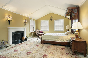 Master bedroom with gold walls