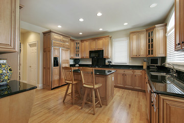 Large kitchen with wood cabinetry
