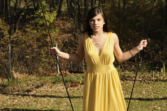 women swinging in fall season