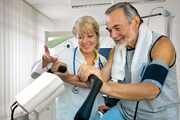 Patient is being observed by doctor - EKG test