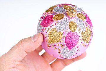 Christmas single pink decoration ball in hand