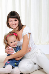 Young mother and her young daughter