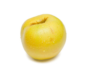 Ripe yellow apple on white