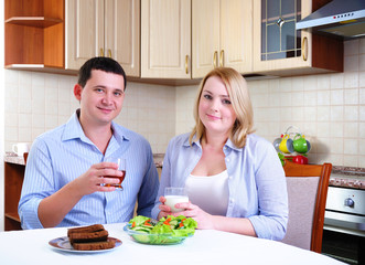 wife and husband have breakfast