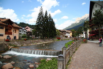 Fototapeta premium Panoramic view of Moena, on the bridge on the Avisio