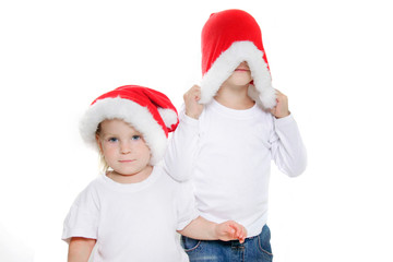 two cute santa helpers over white