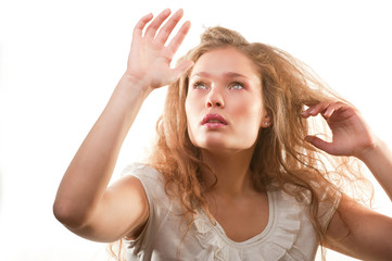 Bright fashion portrait of beautiful young woman on white