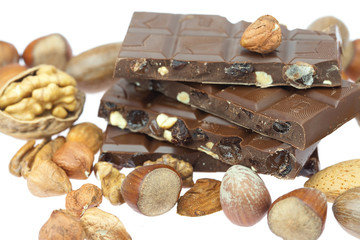chocolate bar and nuts  isolated on white