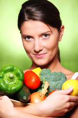 Young woman with vegetable basket