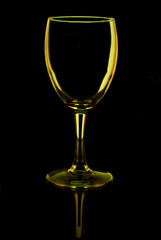 transparent empty wine glass on black