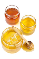 honey in jars isolated