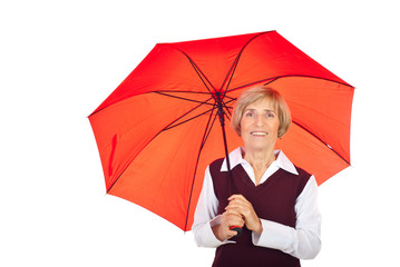 Smiling senior woman with umbrella