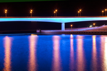 Blue light on the water under bridge