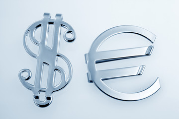 Metallic sign euro and dollar