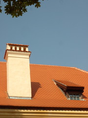 Red roof and white chimney
