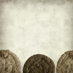 textured old paper background with sweet cookies