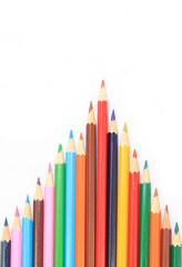 Colored pencils on white background