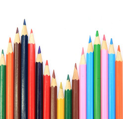 Colored pencils on white background