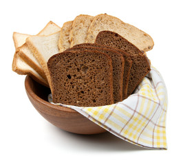 Three kind of bread in wooden bowl isolated on white