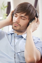 man listening music