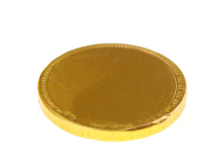 gold chocolate coin isolated on white background