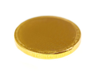 gold chocolate coin isolated on white background
