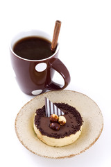 cup of coffee and chocolate tart
