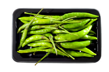 green chili on black tray