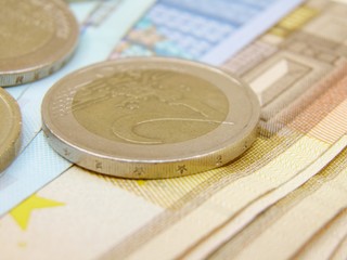 Euro currency banknotes and coins