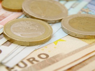 Euro currency banknotes and coins