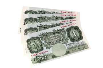 Four old, out of date, pound notes