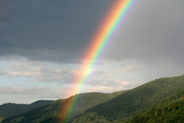 Rainbow in mountains
