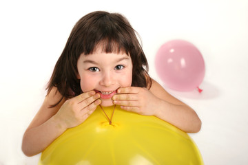 Little girl and two balloons