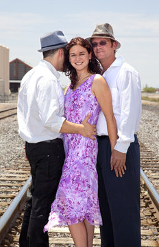 Woman with two men representing a romantic triangle