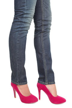 Pink high heels and jeans
