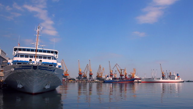A white passenger ship docked in the port (Full HD)