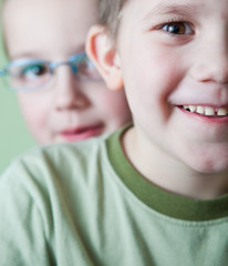 two little brothers happy together (shallow DOF; color toned ima