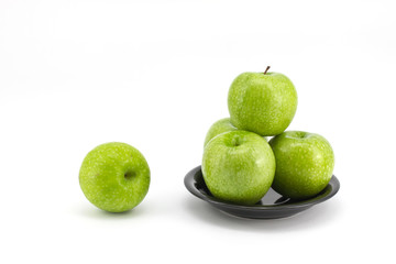 green apple with plate
