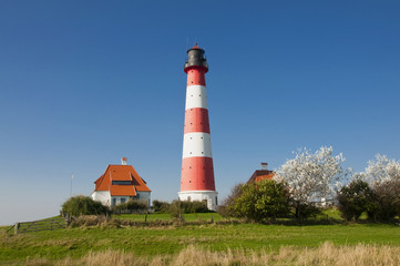 Fototapeta na wymiar Leuchtturm in Westerhever