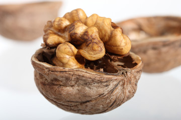 Cracked walnut on neutral background