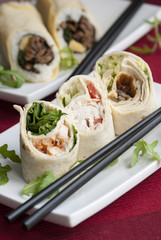 Sweet chilli chicken, chicken caesar and Hoisin duck in a wrap